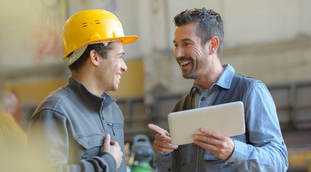 Construction Workers Laughing and Talking